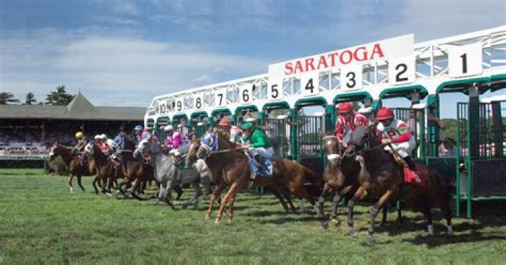 How do I book a table at Saratoga Race Track?