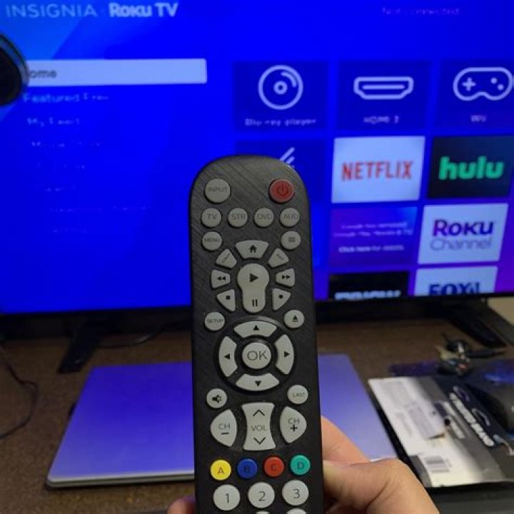 How do I program my universal remote to my Motorola cable box?