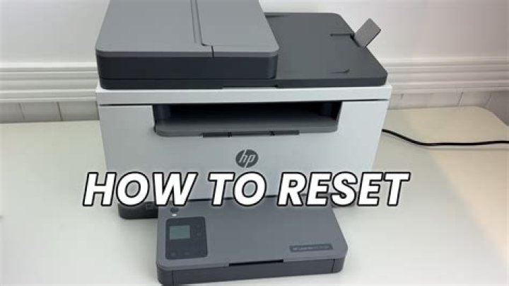 How do I reset my HP m1132 printer?