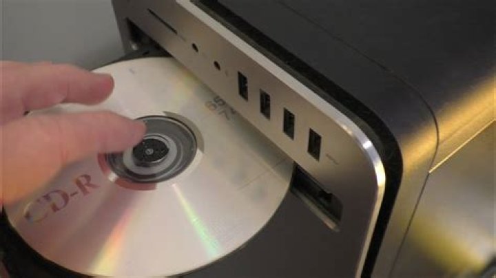 How do you burn a DVD using Toast?