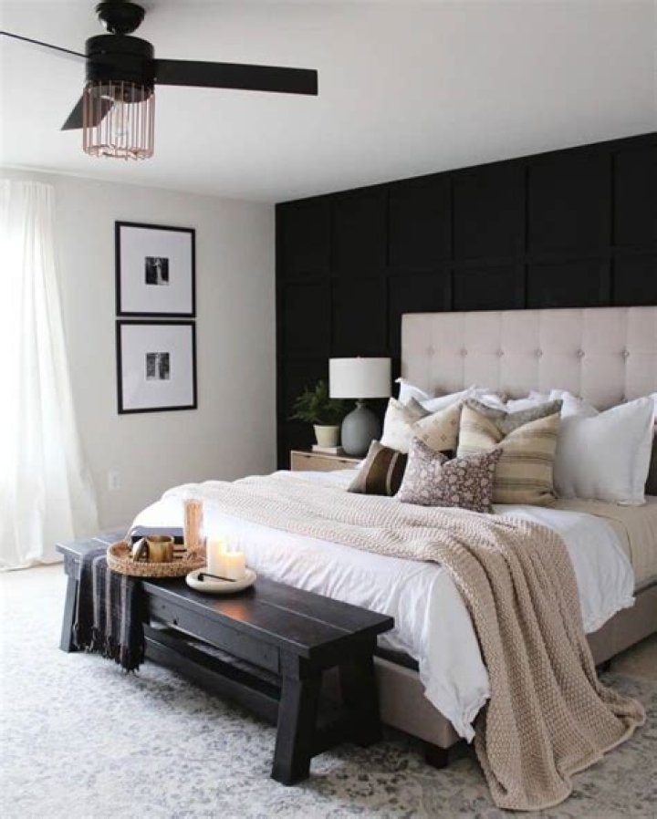 How do you decorate a master bedroom with black furniture