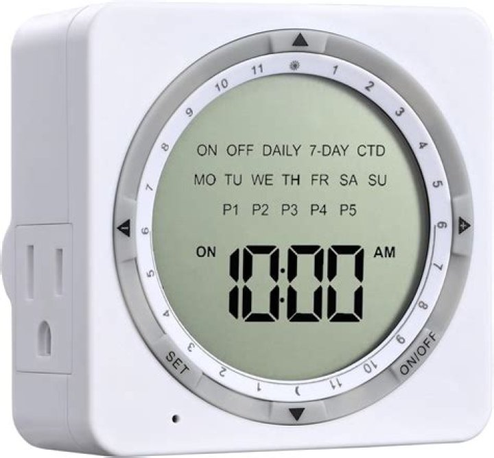 How do you set a digital lamp timer?