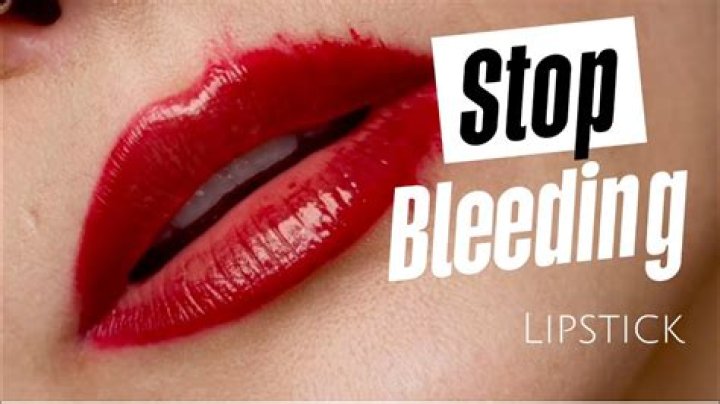How do you stop a lip from bleeding fast?