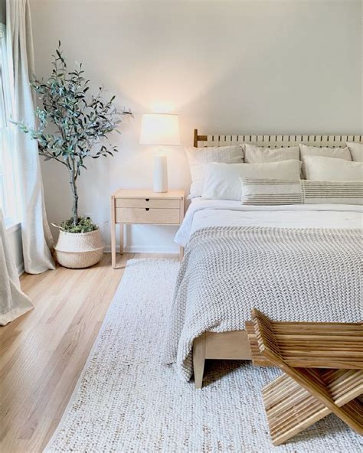 How do you style a Scandinavian bedroom?