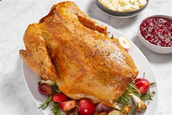 How long will it take to cook a 13 lb turkey stuffed?