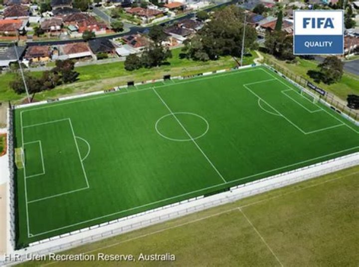 How much does an artificial turf football field cost?