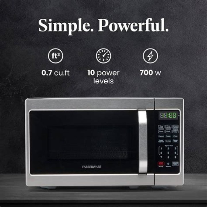 How much longer does a 700-watt microwave cook?