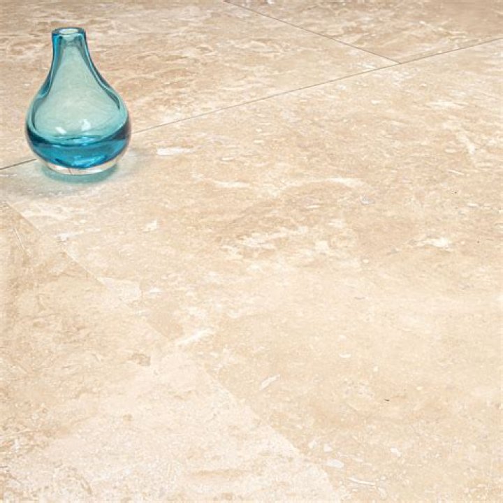 Is honed and filled travertine slippery?