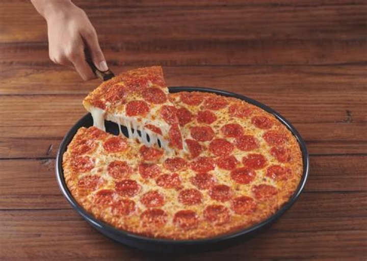 What does Pizza Hut put on their crust?