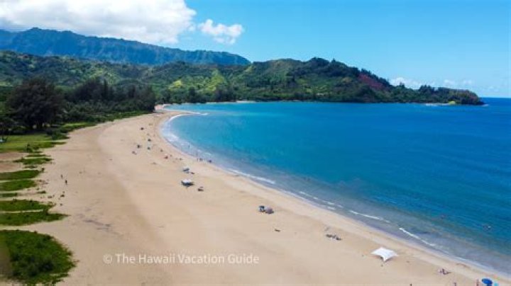 Which side of Kauai gets the most rain?