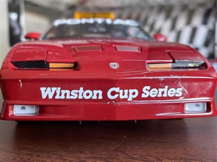 Who is in the 1987 Winston poster?